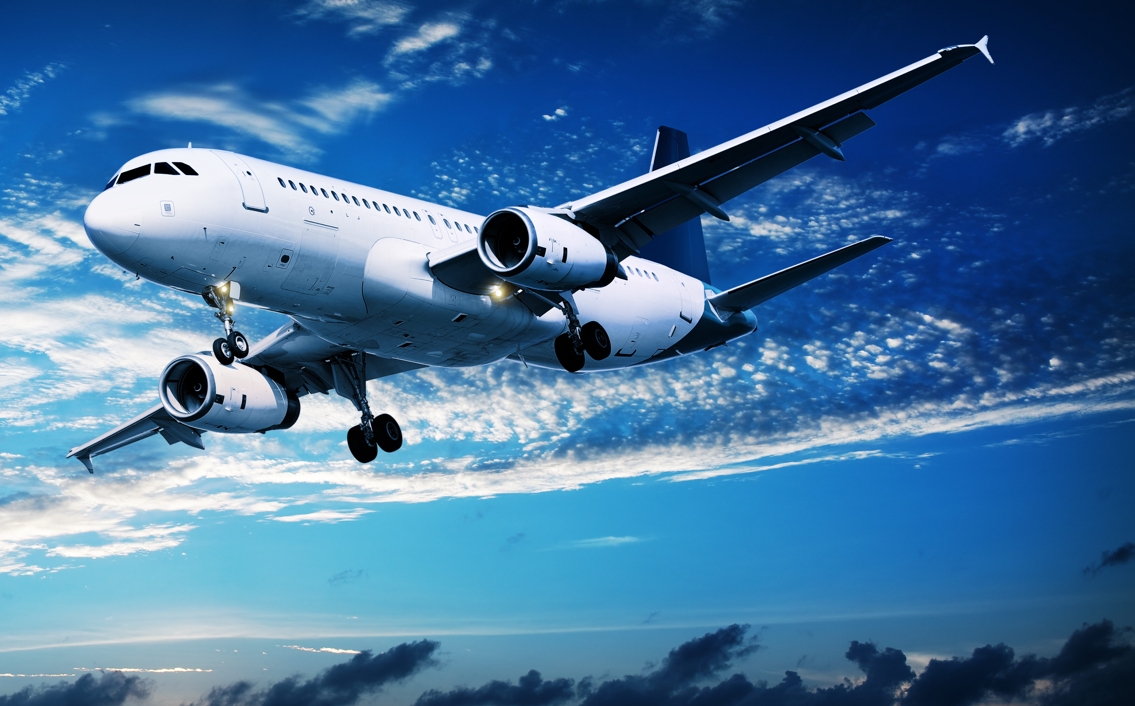 Panoramic,Composition,Of,A,Flying,Jet,In,A,Sunset,Sky content-image